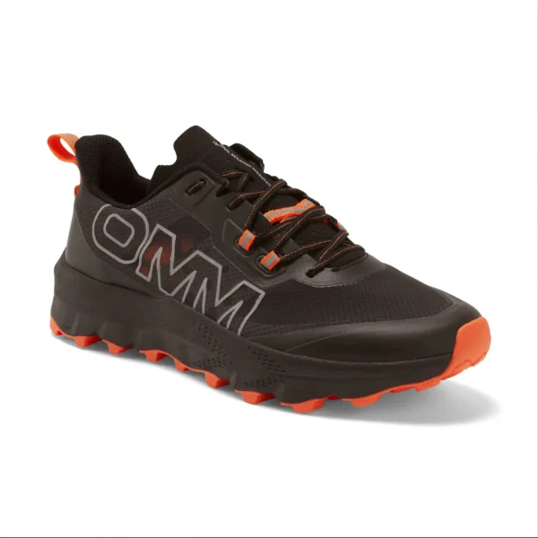 Front three-quarter view of the OMM Trail Shoe in black