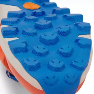 Trail shoe orange sole web