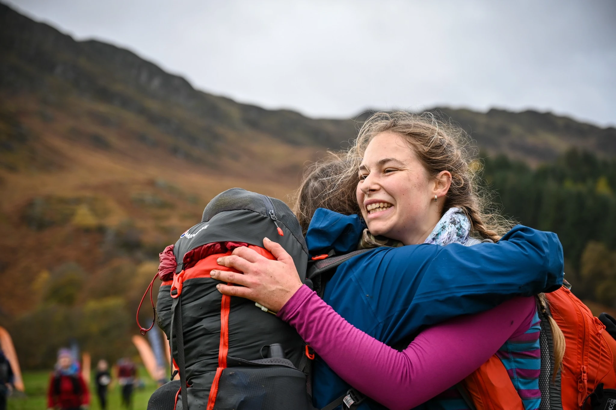 Two OMM competitors studying their map together