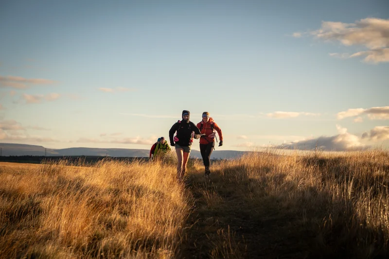 Golden light across open OMM mountain terrain