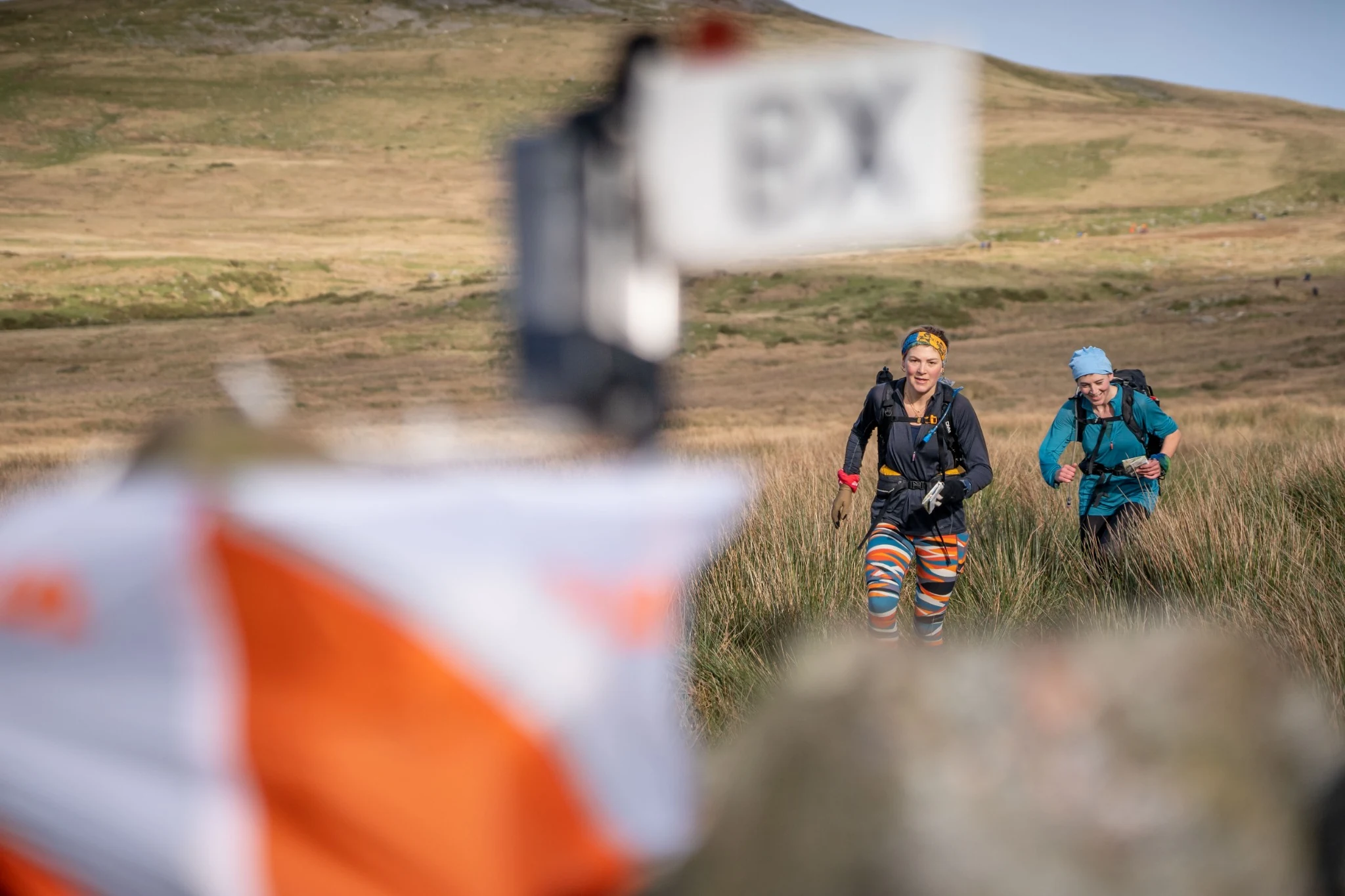 Two OMM competitors studying their map together